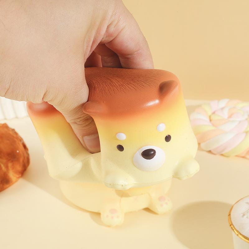 Slow Rise Cheese Cake Dog squishy toy, side angle view