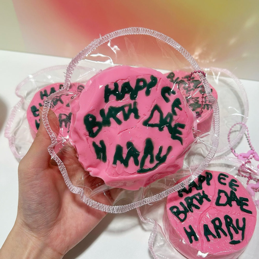 Happee Birthdae Cake squishy toy, close-up of frosting detail