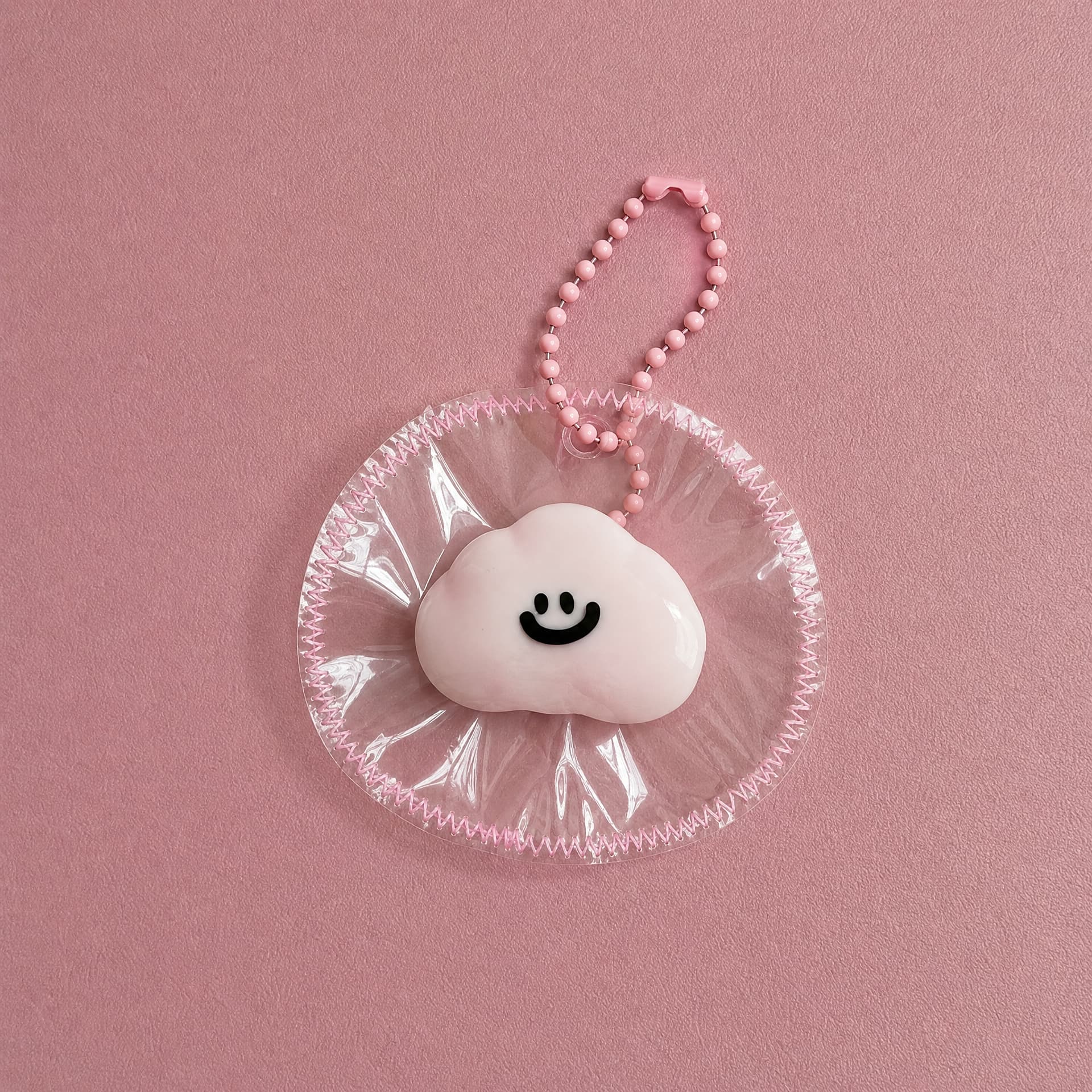 Lil Mini Squeeze Charm, cloud design on pink background