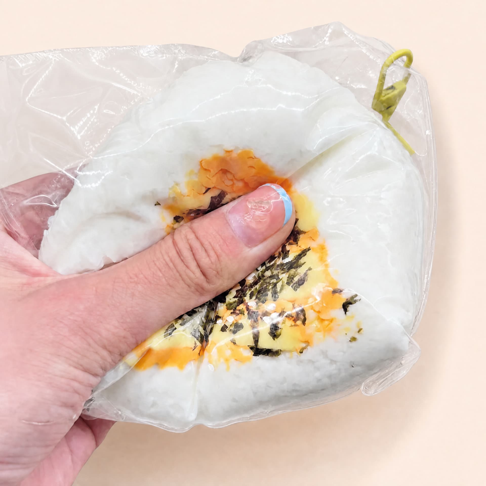 Ultra-slow Rebound Onigiri Taba rice ball squishy toy being squeezed