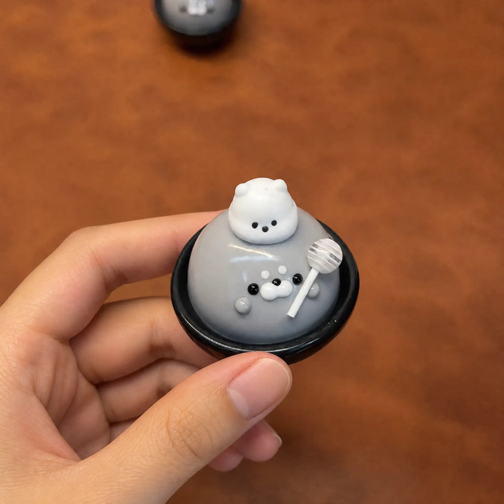 Little Seal squishy toy held in hand, first angle