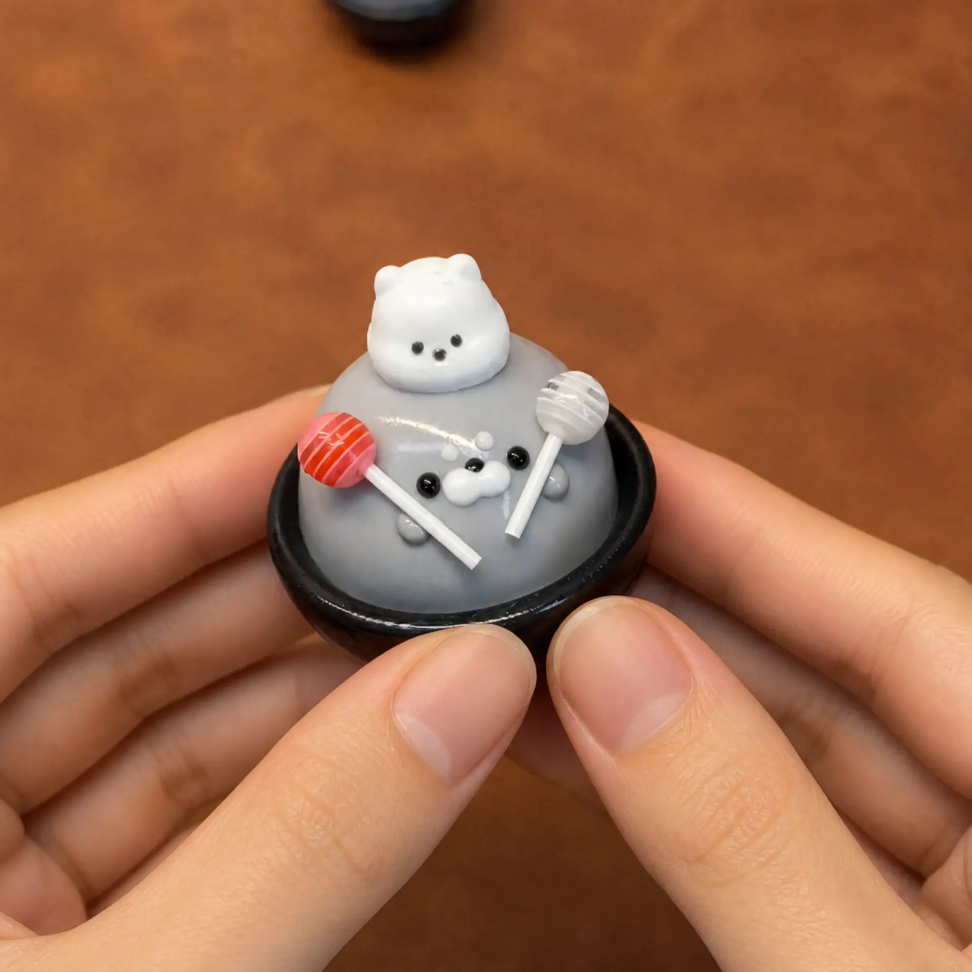Little Seal squishy toy held in hand, second angle